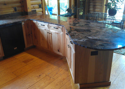 Rustic hickory cabinets, granite sink, Brazilian fusion chiseled edge countertop